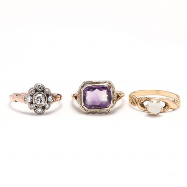 three-gold-and-gem-set-rings