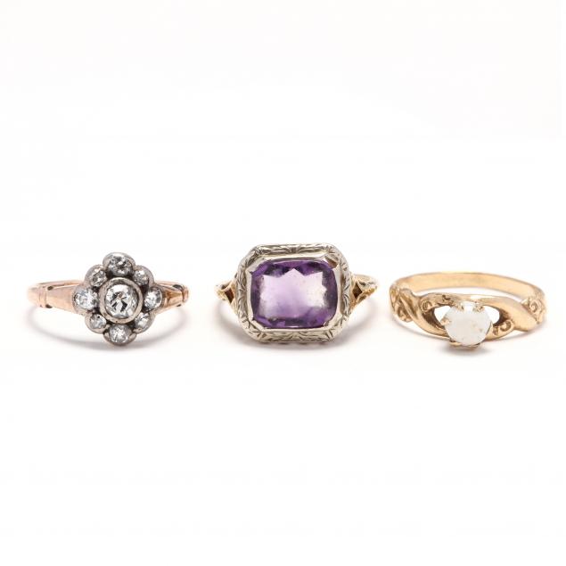 three-gold-and-gem-set-rings