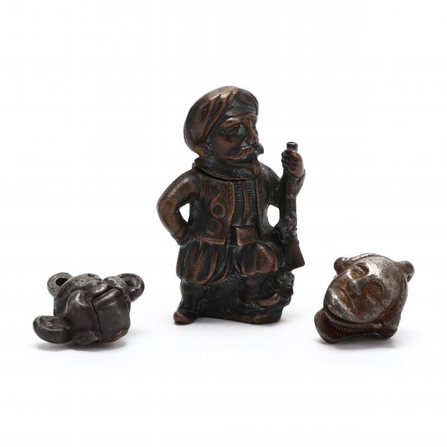 three-antique-small-metal-novelties