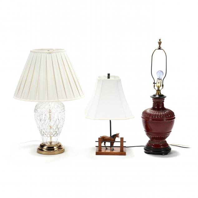 a-grouping-of-three-lamps