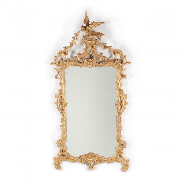 a-large-italian-rococo-style-carved-and-gilt-mirror