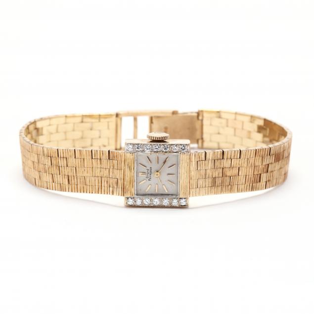 14kt-gold-and-diamond-watch-girard-perregaux