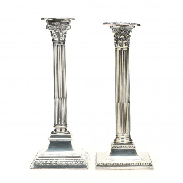 a-near-pair-of-english-corinthian-silverplate-candlesticks