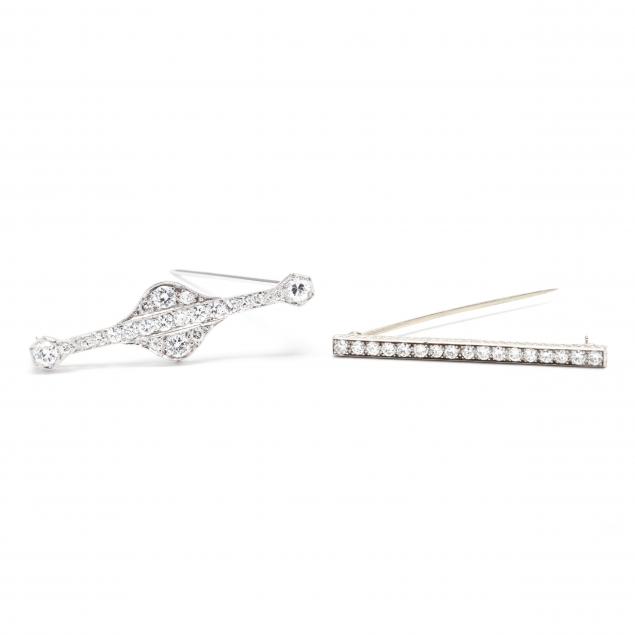 two-platinum-and-diamond-bar-brooches