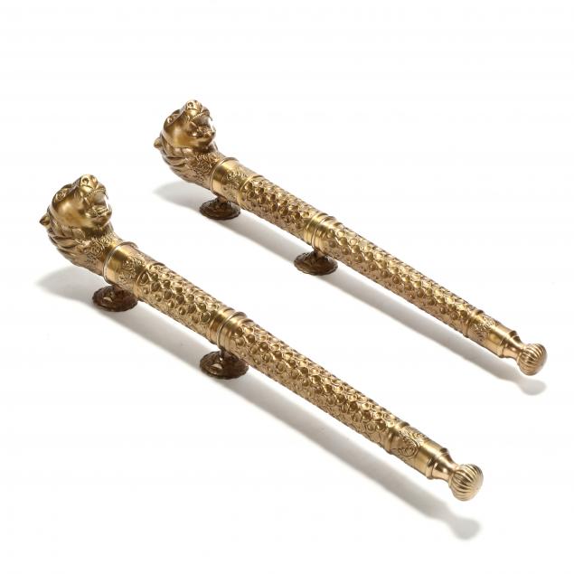 a-pair-of-decorative-brass-wall-appliques