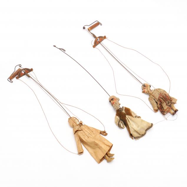 three-vintage-handmade-marionettes