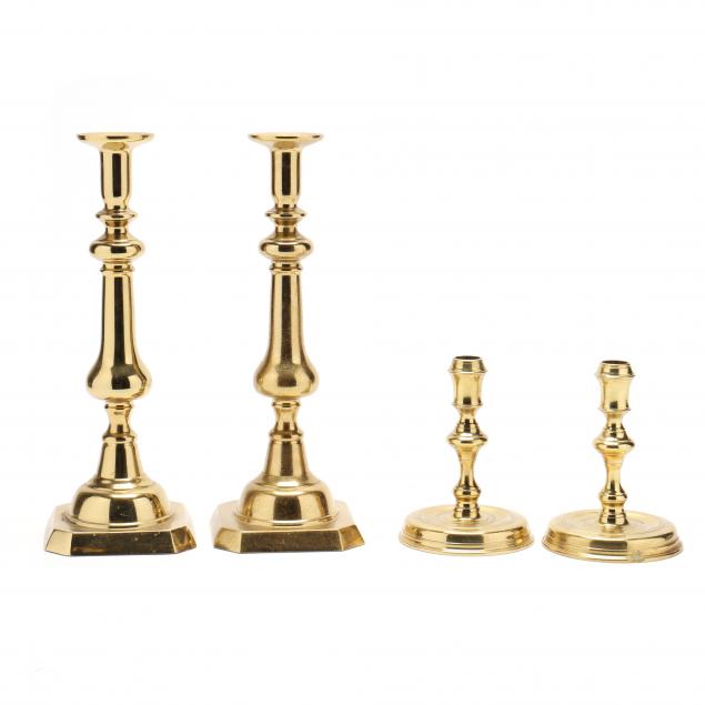 two-pairs-of-brass-candlesticks-signed