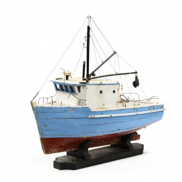 vintage-wooden-model-of-a-north-carolina-fishing-boat-on-stand