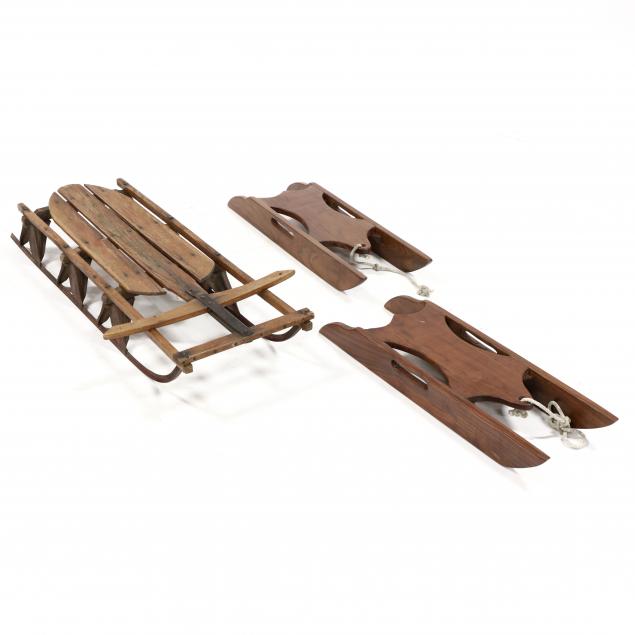 three-wooden-child-s-sleds