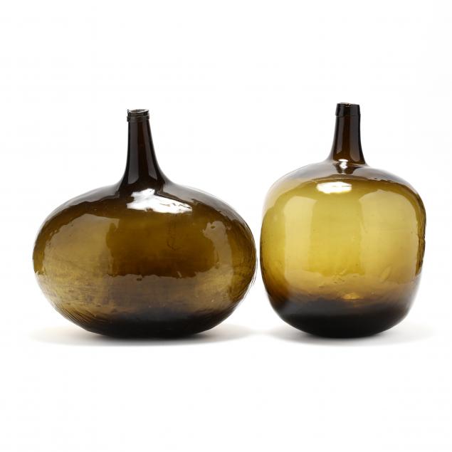 two-large-olive-green-demijohn-bottles