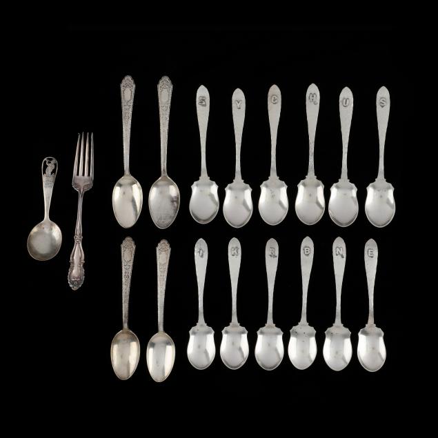 a-grouping-of-sterling-silver-flatware