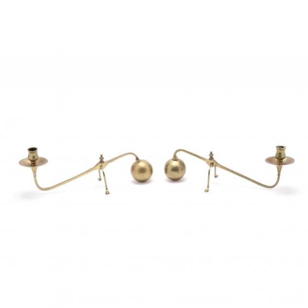 pair-of-brass-counterbalance-cannonball-candle-holders