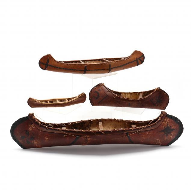 four-vintage-birchbark-canoe-models