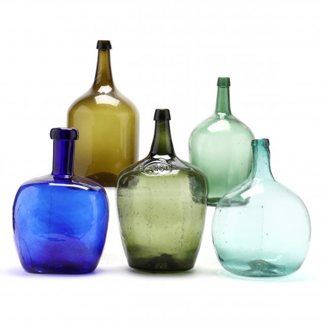 colorful-group-of-five-large-storage-bottles