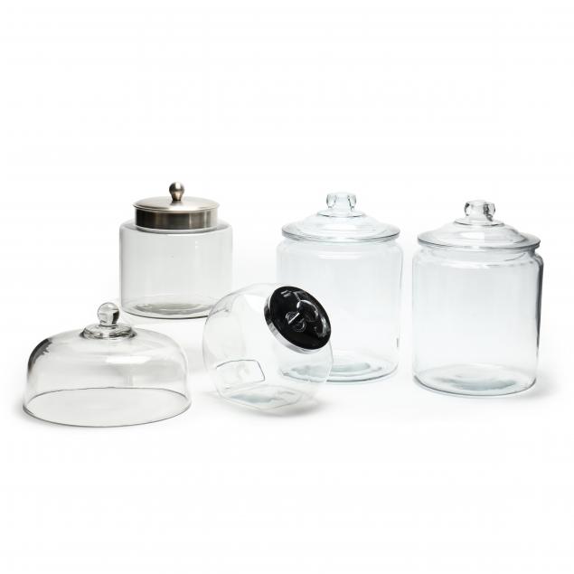 five-clear-glass-lidded-countertop-containers