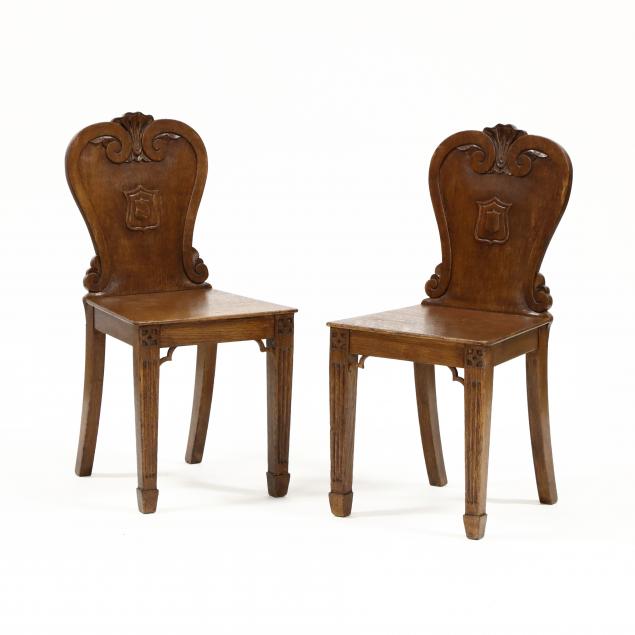 pair-of-vintage-english-carved-heraldic-side-chairs