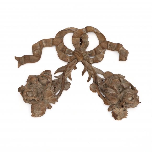 an-antique-carved-ribbon-and-floral-element