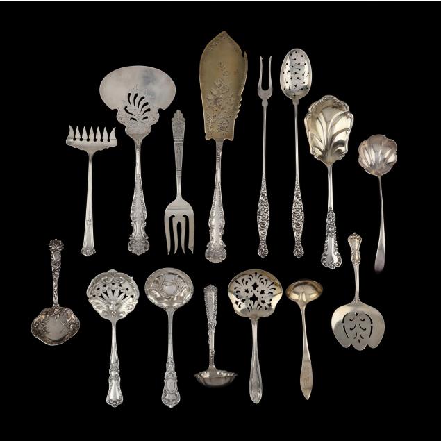 a-grouping-of-antique-sterling-silver-serving-flatware