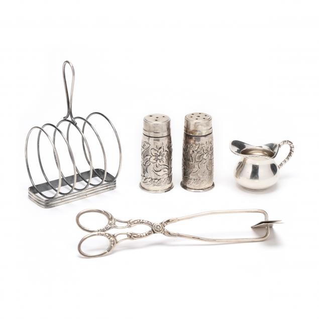 a-grouping-of-vintage-silver-dining-accessories