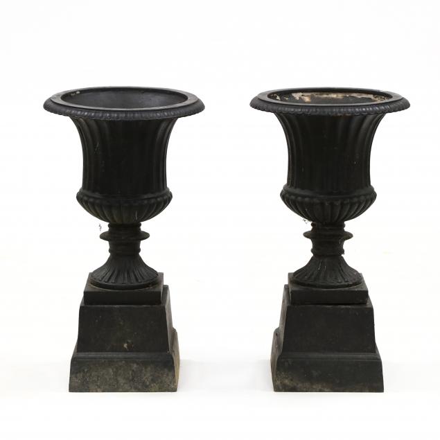 pair-of-cast-iron-garden-urns-on-stands