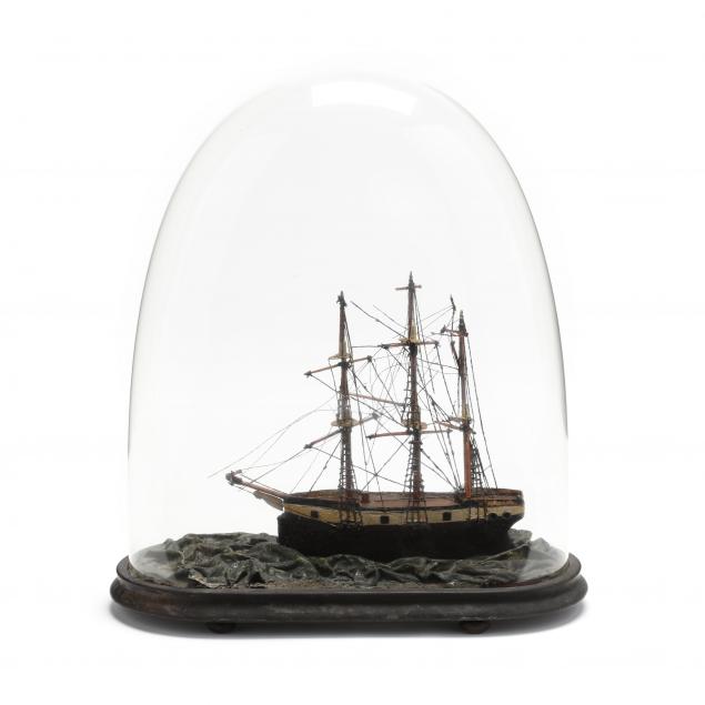 vintage-model-frigate-under-glass-cloche