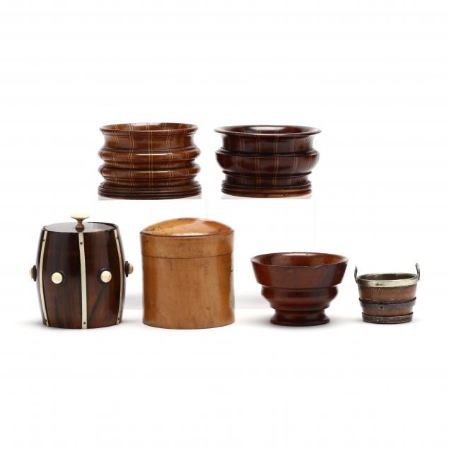 a-grouping-of-antique-treenware-and-a-miniature-bucket