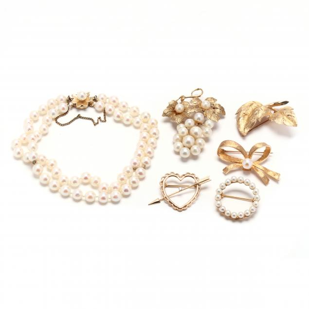group-of-gold-and-pearl-jewelry-items