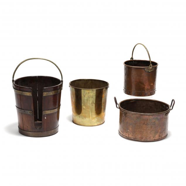 a-grouping-of-four-antique-pails