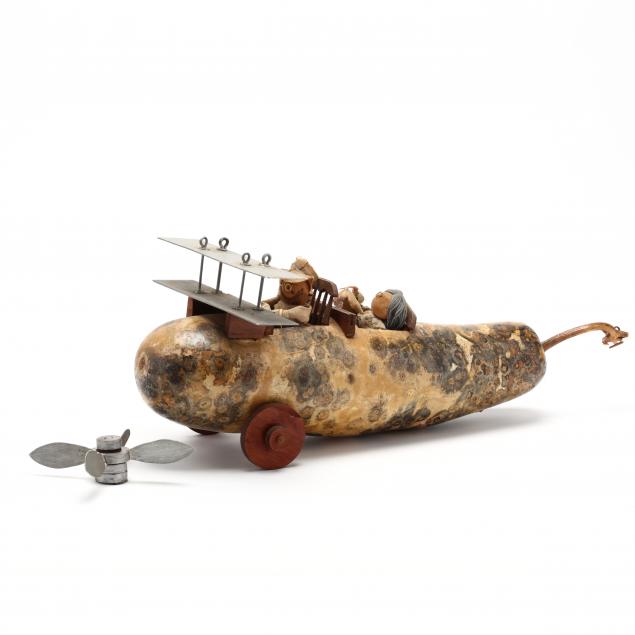 a-whimsical-contemporary-folk-art-gourd-biplane