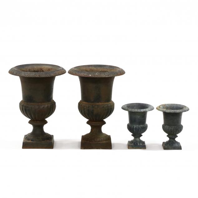 two-pair-of-cast-iron-garden-urns