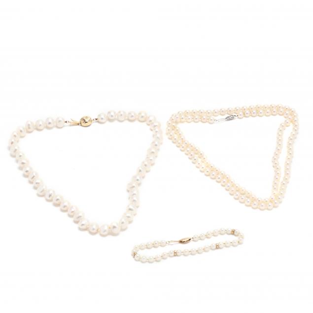 two-pearl-necklaces-and-a-bracelet