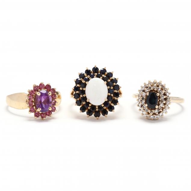 three-gold-and-gem-set-rings