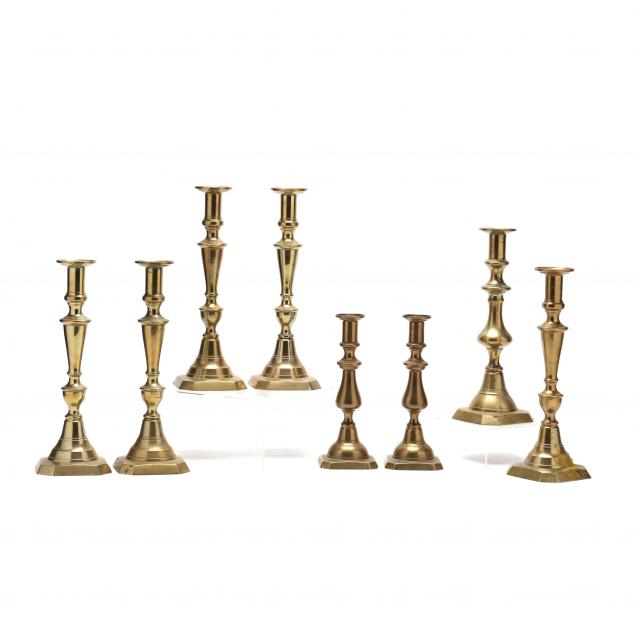 eight-antique-brass-candlesticks