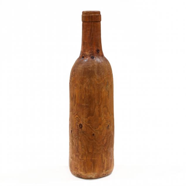 monumental-hand-carved-wooden-wine-bottle