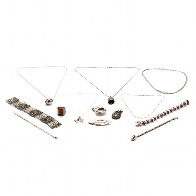 group-of-silver-jewelry-items