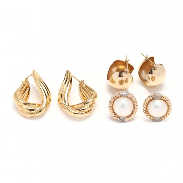 three-pairs-of-gold-earrings