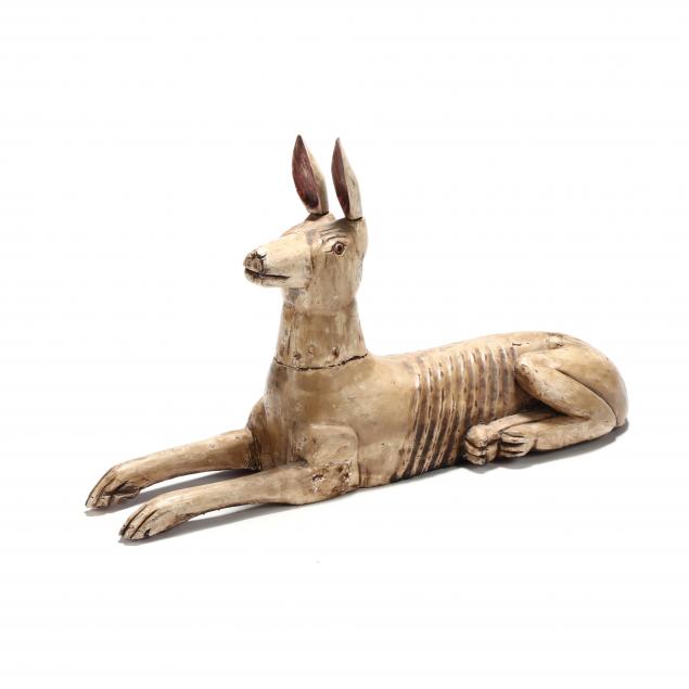 decorative-carved-and-painted-recumbent-dog