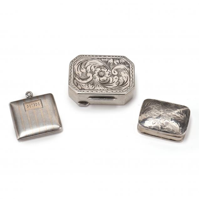 three-silver-miniatures
