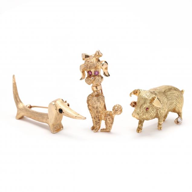 three-gold-figural-brooches