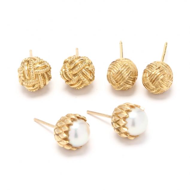 three-pairs-of-gold-stud-earrings