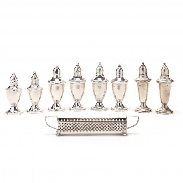 an-assembled-set-of-eight-sterling-silver-salt-pepper-shakers