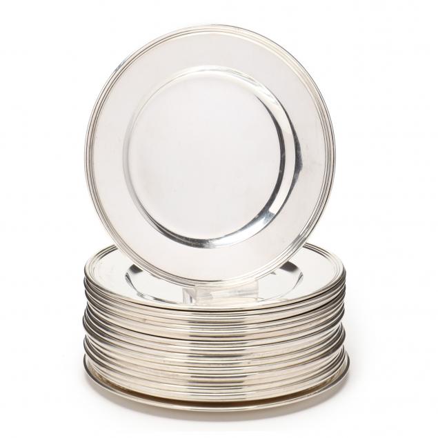 an-assembled-set-of-19-sterling-silver-bread-plates