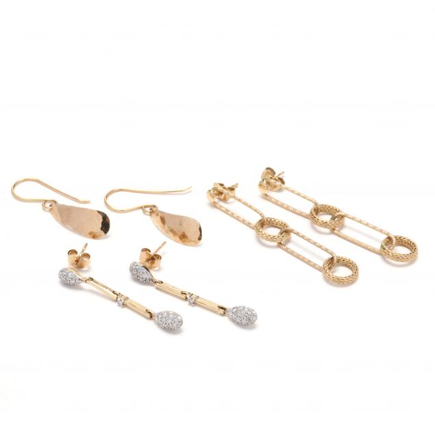three-pairs-of-gold-dangle-earrings