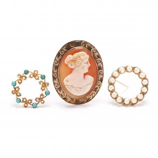 three-vintage-gold-brooches