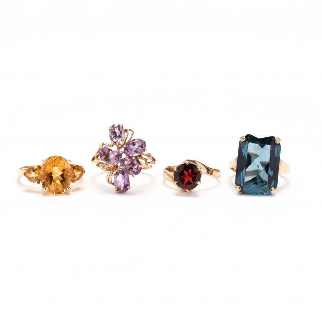 four-gold-gem-set-rings