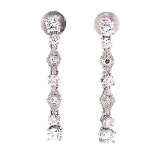 pair-of-platinum-and-diamond-dangle-earrings