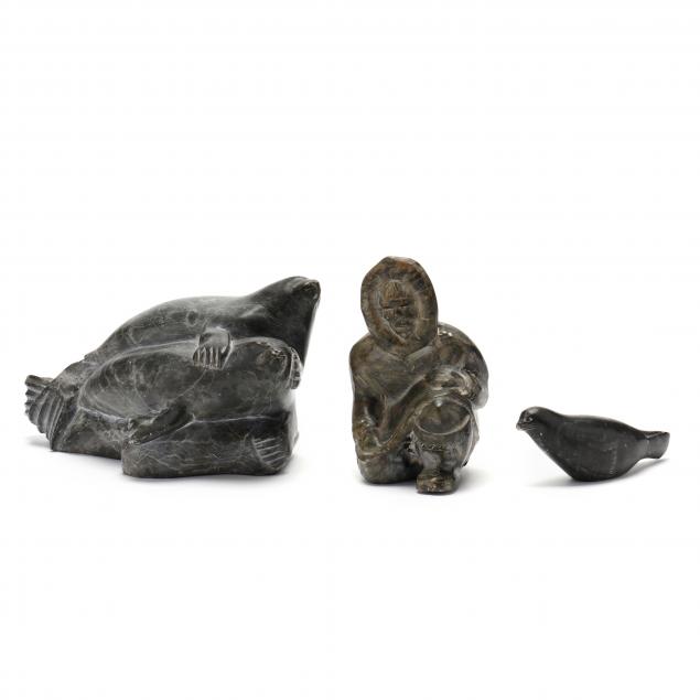 three-inuit-stone-carvings