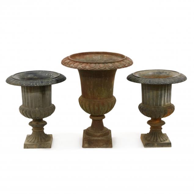 three-classical-style-cast-iron-garden-urns