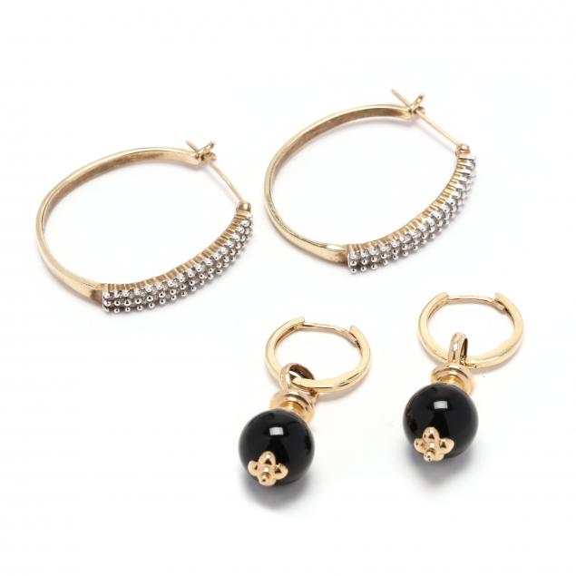 two-pairs-of-gold-earrings