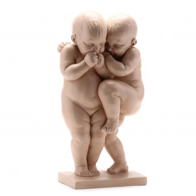 vintage-sculpture-of-two-babies-giggling